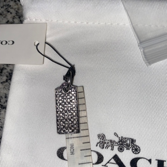 Sterling Silver Signature Hangtag Single Huggie Earring - Picture 9 of 11